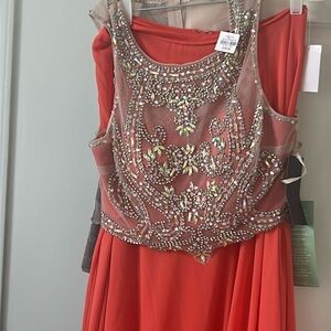 Long skirt and sleeveless beaded top matching set